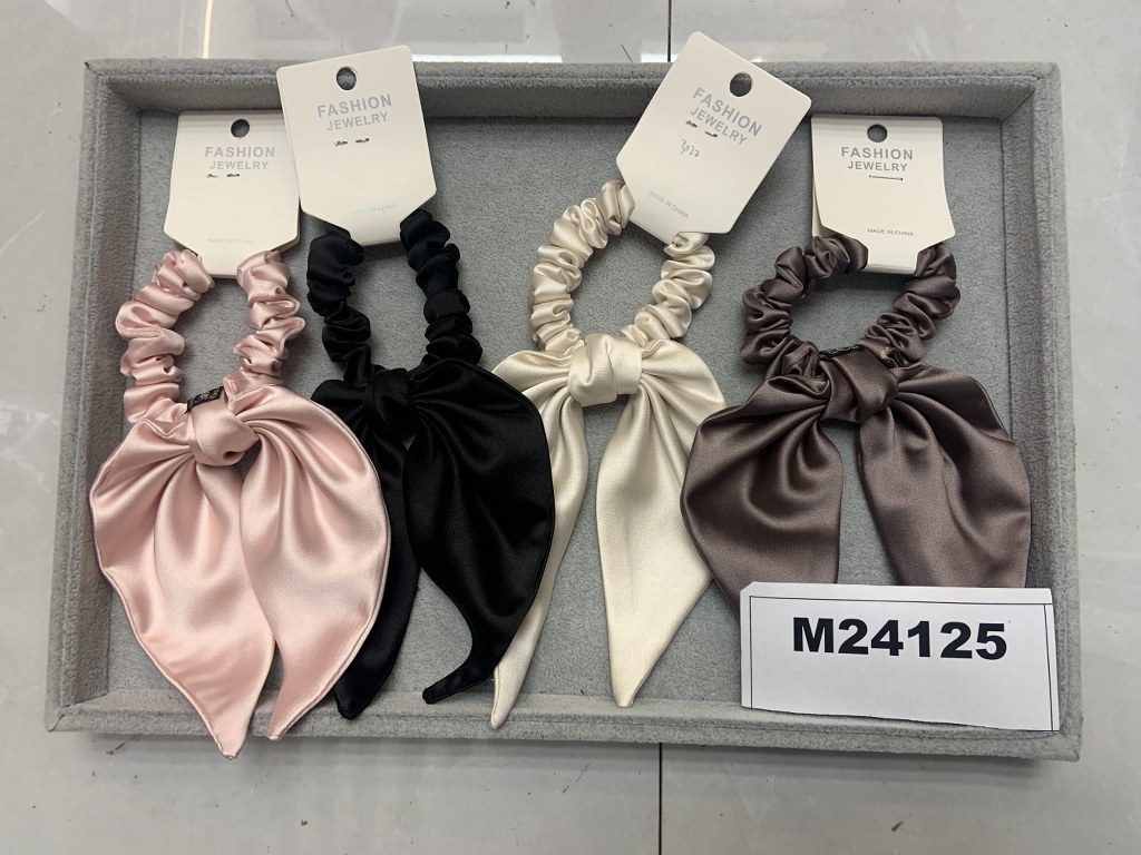Hiusdonitsi rusetilla, värilajitelma, materiaali polyesteri, minimi 120 kpl/väri